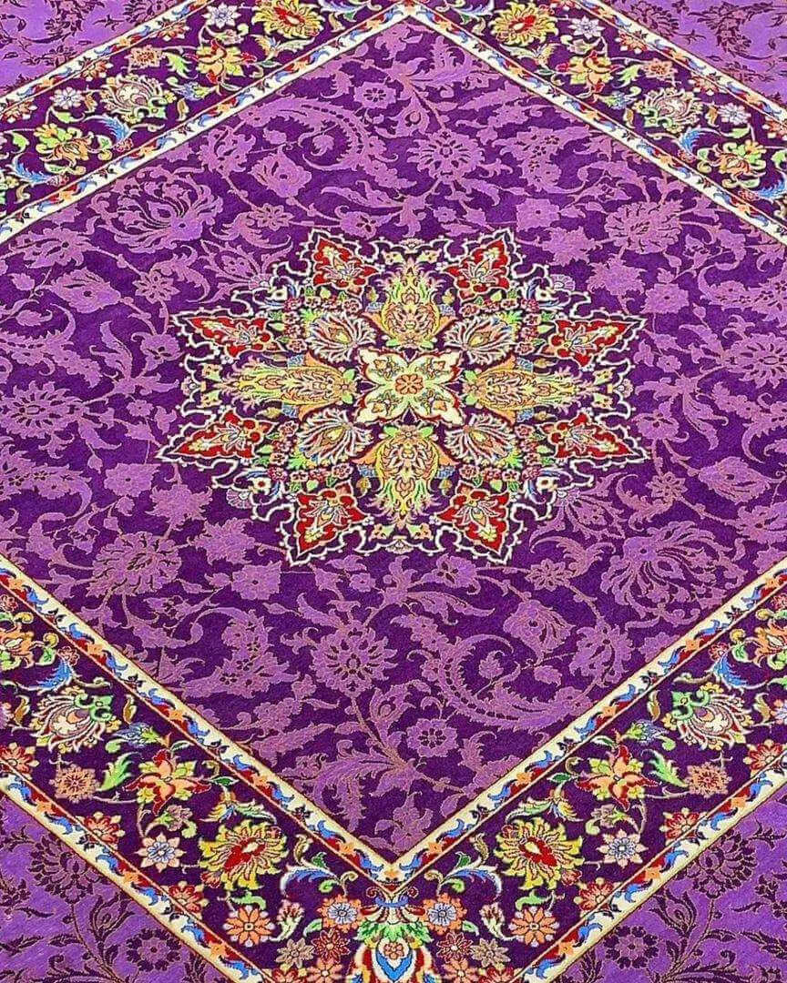 "Luxurious square Persian rug in purple, measuring 200 cm x 200 cm. Handcrafted in Isfahan, Iran, with silk and wool materials, this rug offers 810,000 knots/m² for durability and elegance in any home setting."